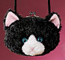 Gund Soft Plush Black Kitty Cat Purse - The purse has a clasp closure. The kitty has blue eyes and an adorable pink nose. The purse is safe for children and 6 inches