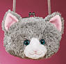 Gund Soft Plush Gray Kitty Cat Purse - The purse has a clasp closure. The kitty has blue eyes and an adorable pink nose. The purse is safe for children and 6 inches