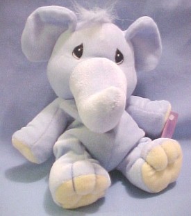 Precious Moments Elephants are gathered here from the Jungle in soft stuffed toys for hugging