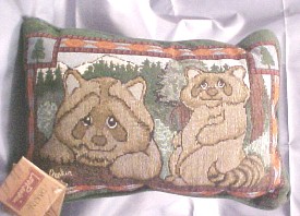 Lou Rankin, who is an artist and sculptor, captures the connection between man and animal through his trademark tender-eye expressions in these tapestry like Pillow Throw, featuring bears and Raccoons.