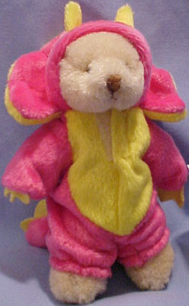They are adorable little Ganz Teddy Bears dressed up in little dinosaur costumes.