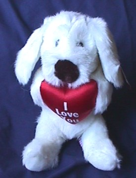 Russ Berrie Plush Luv Pup with Red Heart Stuffed Animal Russ Berrie Plush Luv Pup with Red Heart Stuffed Animal
- I Love You is written on the front of the satiny red heart