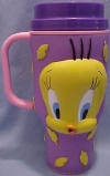 Looney Toons Tweety Travel Mug 7 1/2 inches high 4 inch diameter 5 inches wide