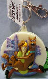 Scooby Doo's Haunted Key Chain - Press on Scooby and Shaggy and the house lights up and makes eerie sounds.  FOB is 2 1/2 inches