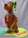 Poseable Scooby Doo Snowboarding -  Scooby velcros to the snowboard is 13" long and 6 1/2" wide  Scooby is 14 inches high with a 6 inch tail