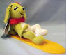 Dakin Dream Pets Hawaiian Rufus the Plush Hound Dog - (reintroduced Spring 2004) Hawaiian Hound Dog is the # 21 Dream Pet in the new and old series of Collectibles. His ears and tail are poseable. Dog is 6 inches the Surf Board 8 1/2 inches