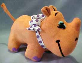 Dakin Dream Pets Rhinestone the Plush Rhinoceros  - (reintroduced Spring 2004) Rhinestone Rhinoceros is the # 14 Dream Pet in the new and old series of Collectibles.  Her tail is poseable. 