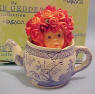 Anne Geddes Teapot Baby Figurine - "Appreciate The Beauty And Charm Of Little Children" 2 1/4 inches high by 2 1/2 inches wide