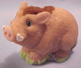 Precious Moments Saminal Warthog - his puzzle piece reads: "Home of the Wharthog. Be sure to find all his friends!" 1 1/2 inches high by 2 inches wide by 1 inch deep