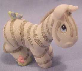 Click here to go to our Precious Moments Saminal Figurines Collection