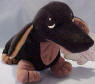 Precious Moments Tender Tail Bean Bag Plush Black & Brown Dachshund - Introduced Feb. '00 Stray Paws Collection 'Dachshund' "Originating in Germany, my first ancestors came to the United States in 1887. My unique shape has made me quite popular. I'm brave and independent yet very loyal to my master. I've been called 'the long low shadow' always by my master's side."  His tag reads: "I'm Sweet and precious and may be a stray, but if you adopted by you, forever we'll play."  9 1/2 inches