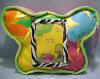 Disney's Lizzie McGuire Butterfly Plush Pillow with Picture Frame - (safe for ages over 3)  Materials are velvety and silky BRIGHT colors. (frame is 2 1/4" x 3 1/4") The pillow is 9 inches wide by 6 1/2 inches high by 1/2 inch thick
