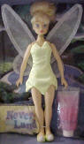 Disney Fairy Tinker Bell Doll Pixie Set - Complete with a bag of stars and a tube of body glitter.  She comes in a collectors box with handle &nbsp;Poem on the box:  "All it takes is faith and trust and a little bit of pixie dust... Think of the happiest things it's the same as having wings!" 8 inches