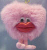 Gund Pink Fuzzy Kiss A Moley Heart with Kissing Sound - This adorable fuzzy pink heart has legs and ruby red satiny lips.  When you dangle it from the gold hanger, it makes a kissing sound. safe for all ages  5 1/2 inches