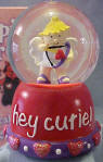 Gund Valentine's Day Musical Water Globes Cupid Plays "Love Me Tender"  Comes boxed in a decorated gift box (see background of picture).  Small red hearts and glitter in globe.  On the base it reads "Hey Cutie!"  Has hearts and beads around bottom of base.  He is holding the bow and arrow ready to shoot for LOVE! 3 inches
