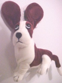 This adorable Hush Puppy Basset Hound is magnetic and can hang from any metal surface like the fridge!