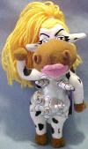 Meanie Moodonna as Madonna (Infamous Series 2) (dated 1997, 1998) Poem in tag: "Like a beanbag, (whoo!) stuffed for the very first time, Her music is great, but her acting's a crime. Now check out those udders, She's the talk of all Mudders. This material cow is way past her prime!" 8 inches