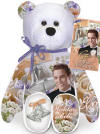 The Bear in sitting position view of the Elvis 'Wedding Bells' Teddy Bear - (this is the 17th bear in the series) The back of the bear has a large picture of wedding bells and the words Marriage and Love. The tag and bear have picture of Elvis in a tuxedo and Wedding Bells in several places. Elvis looks REALLY handsome in his black tuxedo. 9 inches high