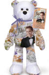 The Front view of the Elvis 'Wedding Bells' Teddy Bear - (this is the 17th bear in the series) The back of the bear has a large picture of wedding bells and the words Marriage and Love. The tag and bear have picture of Elvis in a tuxedo and Wedding Bells in several places. Elvis looks REALLY handsome in his black tuxedo. 9 inches high