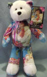 Elvis 'Aloha from Hawaii' Teddy Bear - (this is the 2nd bear in the series) The Elvis Aloha Bear has colorful images from his Hawaii Concert in 1973. Both the front and the back of the bear are GREATLY detailed! The Bear wears a tag with information about the 'Aloha from Hawaii' Concert: "The 'Aloha from Hawaii' bear, commemorates Elvis' record breaking concert, performed in Honolulu, January 14, 1973. Broadcast live via satellite, it had over 1 billion viewers worldwide. The Aloha from Hawaii soundtrack became number one on the Billboard pop album chart for 52 weeks! Elvis Presley Enterprises, Inc. has authorized Limited Treasures to produced LIMITED Edition Elvis Presley Teddy Bears that are fully licensed. This series is INCREDIBLE! Limited Treasures has perfected a technique to take full color images and permanently imprint them on a canvas of plush bean bears, while maintaining the soft plush feel of the fabric. 9 inches