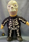 The Simpsons' Homer as Skelly - Homer's costume glows in the dark 15 1/2 inches