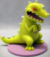 Nickelodeon's Rugrat Reptar PVC Figure 1997 Viacom International Inc.  2 1/2 inches high baset 1 3/4 inches diameter