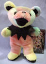Liquid Blue Grateful Dead Beanie Bear Cosmic Charlie - quantity produced 134,592 Retired 10/1/99 born 1/8/66 the Fillmore Tour Memory: My white '68 bus broke down on the way to Chicago when a police car pulled up. I thought I was gonna get hassled for sure, but instead the cop was a head and had a bus himself! He helped me fix it and we've traded tapes ever since. The teddy bear is approximately 7" tall.