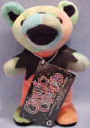 Liquid Blue Grateful Dead Bean Bear Cosmic Charlie - quantity produced 134,592 Retired 10/1/99 born 1/8/66 the Fillmore Tour Memory: My white '68 bus broke down on the way to Chicago when a police car pulled up. I thought I was gonna get hassled for sure, but instead the cop was a head and had a bus himself! He helped me fix it and we've traded tapes ever since. The teddy bear is approximately 7" tall.