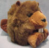 Puffkins Bean Bag Plush Chomper the Beaver - DOB 2/5/97 (light purple tag) Chomper can often be heard shouting "timber", cutting down trees in preparation for winter. After a long day Chomper curls up to sleep, so make sure you don't make a peep. (1 of the Original 13 Puffkins and has been retired) 5 inches