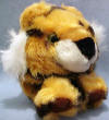 Puffkins Bean Bag Plush Tipper the Tiger - DOB 4/15/97  (dark purple tag)  When she sleeps at night by your side, her purr makes you all tingly inside.  If it's love and companionship you seek, she'll give it to you faithfully every week.  (From the 2nd Series of Puffkins and has been retired)  5 inches