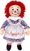 Large Plush Classic Raggedy Ann Rag Doll - Ann is dressed in a floral print dress.  A white apron is over the dress with Raggedy Ann embroidered in script. 17 inches high safe for ages over 3