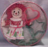 2003 Raggedy Ann Christmas Cookie Set Includes 6" Doll, three cookie cutters (tree, star, and heart), and a delicious recipe in a collectible Tin! 6 inch diameter tin