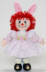 2004 Easter Raggedy Ann - Bunny ears are removeable with the snip of a few threads.  She has shiny black shoes with bunnies on them.  Her outfit is pink checkered, white, and pink and white striped with blue flowers and a few green accents.  18 inches high with ears