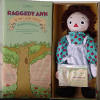 Storybook #4 Limited Edition Raggedy Ann & The Lucky Penny - The Raggedy Ann Lucky Penny Rag Doll is the 4th in a Series of Storybook Dolls.  she comes in a story box with lid.  Limited edition of 10,000.  Comes in a storybook box with lid and a hand numbered certificate of authenticity.. Raggedy Ann has a Lucky Penny hanging from her pocket. Raggedy Ann's Lucky Penny has "I Love You" on the back.  17 inches tall