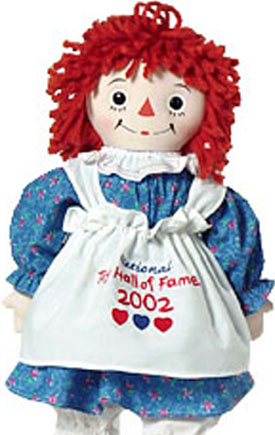 Applause Dakin Limited Edition 2002 National Toy Hall of Fame Raggedy Ann Rag Doll - Special Commemorative Raggedy Ann National Toy Hall of Fame Edition. On March 27, 2002, Classic Raggedy Ann was selected to join previous winners like roller skates, jacks and bicycles in the prestigious Toy Hall of Fame. The National Toy Hall of Fame in Salem, Oregon was established in 1998 to recognize toys that have inspired generations to learn and create, which benefits a timeless toy like Raggedy Ann. This doll is a commemorative piece honoring Raggedy Ann's timeless appeal.  This Raggedy Ann is a 20" Georgene 1940's style rag doll. She has a printed, rounded, more friendly face and flat shoe button eyes.