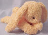 Russ Berrie Home Buddy Bunny Hops Hops Peach Laying Down Born on May 7, 1997 6 1/4 inches