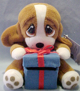 Sad Sam and Honey Basset Hounds for Valentine's Day are ready for love!  The adorable Puppies are dressed in their Valentine's best carrying hearts, boxes and more!