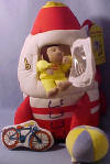 Curious George Rocket Playset - The Plush Space Rocket makes a blasting off sound when played with.  Rocket 11 1/2" H x 9 W  George 5" Ball 3" Bicycle 4" 