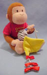urious George Wiggler with Kite and String - pull on the kite and watch Curious George Wiggle and Jiggle back to it. 6 inches