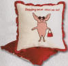 Gund Olivia Pig 'Shopping never wears me out!' Pillow - The front of this plump pillow has a picture of Olivia Pig wearing sunglasses and carrying her red purse.  The pillow reads "Shopping never wears me out!".  The pillow is machine washable.  9 inches square