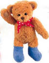 Gund Rambling Ted Plush Teddy Bear -  Rambling Ted is a soft plush teddy bear wearing a red bandana around his neck and blue boots.  (safe for children)  