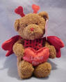 Gund Love Bug Bear - Dressed as a Lady Bug with red heart antennas and wings.  Carrying a red satiny pillow with Love Bug embroidered on it.  8 1/2 inches