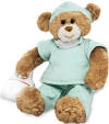 Gund Boy Nurse Golden Brown Teddy Bear in Surgical Scrubs carrying a white Nurse's Bag  safe for ages over 3 11 inches