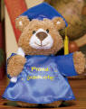 Gund Musical Proud Graduate Bear  He wears a Royal Blue Gown and Cap with a yellow tassel.  Plays the graduation music Land of Hope and Glory 6 inches