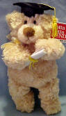 Gund Manni Graduate Teddy Bear  he has a diploma in his paws and a black cap with tassel on his head 8 inches