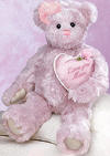 Gund Purple Mom Teddy Bear with Pink Heart Pillow In the bears arm is a pink&nbsp;heart pillow with  LOVE YOU Mom embroidered on the front. Teddy Bear is super silky soft.  safe for children 12 inches high