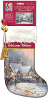 Thomas Kinkade 'A Christmas Welcome' Limited Edition Christmas Stocking - The top of the stocking is white faux fur, then a red velvety stripe with the name of the stocking embroidered in white, and the rest is a SOFT brushed material. There is gold trim embroidered between the colors and textures. The Kinkade logo is embroidered with shiny gold threads onto the toe of the stocking. There is a red velvety hanger attached at the top to use to hang the stocking by the chimney with care! There is a gold tassel with a jingle bell attached to it. 15 inches