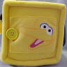 Gund Sesame Street Activity Block (click on the picture for a larger view)  Side 1 is Elmo - Unzip the zipper triangle to see a triangle MIRROR and the word 'triangle'.  Side 2 is Ernie with his Rubber Duckie (Duckie krinkles when you squeeze it) - Unvelcro the oval flap to find a leathery feeling oval shape&nbsp;and the word 'oval'.  Side 3 is Big Bird - Unbotton the buttoned triangle&nbsp;to find a laced platellet&nbsp;to learn how to tie your shoes and the word 'rectangle'.  Side 4 is Cookie Monster - Unvelcro the blue circle to find a cookie that krinkles and the word 'circle'.  Side 5 is Zoe - Unvelcro the orange square to find 2 square plastic toys and the word 'square'  Side 6 is a shiny Sesame Street star - Unvelcro the star to find the numbers 1, 2, 3, 4, and 5 and the word 'star'.  7 1/2 inch cube