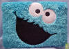 Gund Sesame Street Cookie Monster Plush Photo Album - holds up to 40 4" x 6" pictures. cover of album is an extremely soft plush 7 1/2 inches wide by 5 inches high by 1 1/4 inches deep