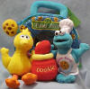 Gund Sesame Street Cookie Monster Cookie Factory 4 Piece Playset - (Baby Safe) Cookie Monster 6", Big Bird 6", Cookie Jar 3 1/2" and a Cookie Shaped Carry Case (closes with a zipper pulled by a chocolate chip to store the pieces in) 6" tall, 6" wide, 3 1/2" deep + 2" handle 